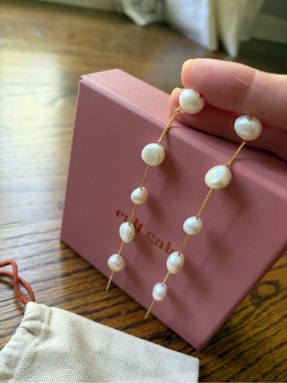 cult gaia White Freshwater Pearl “Atum” Gold Drop Earrings